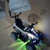 Cuatrimoto Eléctrica Infantil 6V con Luces LED, Sombrilla y Guía de Empuje