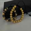 Dúo de Pulseras Balín Italiano Negro y Dorado Oro Laminado 18K  8 mm | Elegancia y Estilo