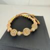 Pulsera San Benito Oro Rosa con Balines y Bola de Fuego Oro Laminado 18K | Fe y Elegancia