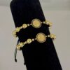 Set de 2 Pulseras San Benito Circones Negros Oro Laminado 18K | Fe y Elegancia