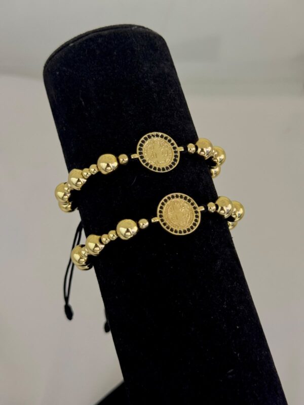 Set de 2 Pulseras San Benito Circones Negros Oro Laminado 18K | Fe y Elegancia